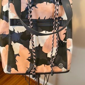 Lululemon Crossbody Bag. Pink and Gray with Drawstring Closure.